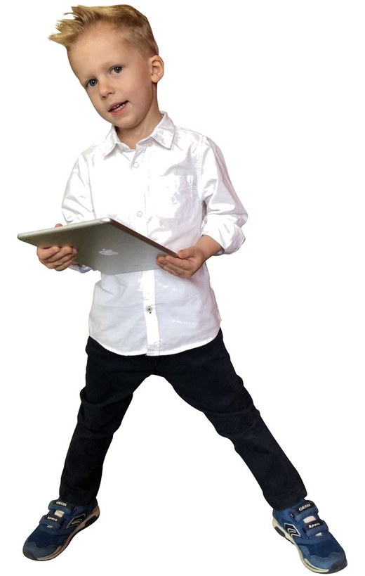 The same boy holding a tablet.